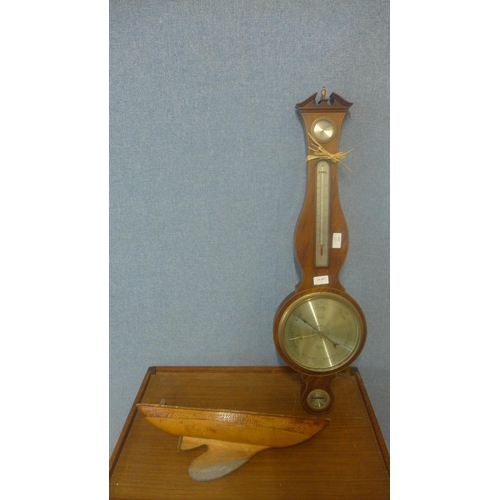 405 - A barometer and model sailing boat hull