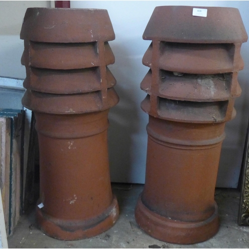 408 - A pair of terracotta chimney-pots