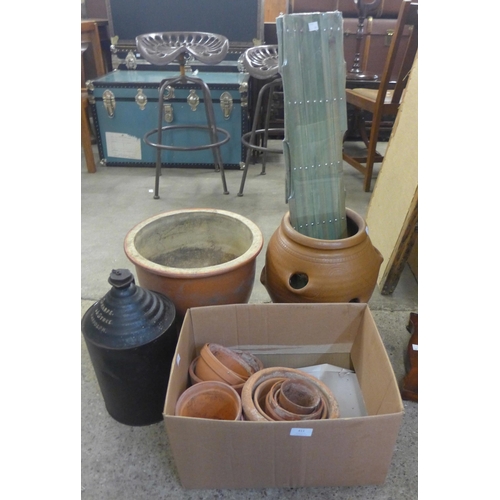 411 - A terracotta strawberry planter, terracotta plant pots, oil can, etc.