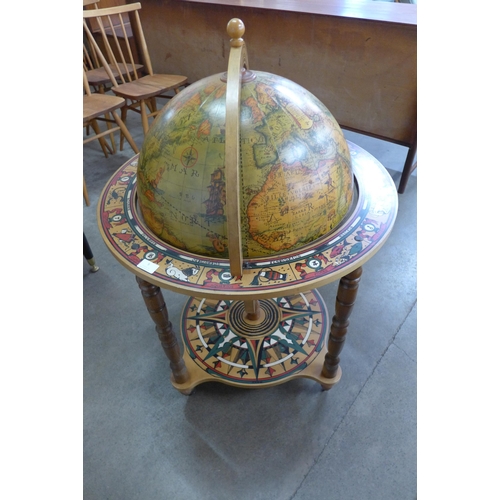 5 - An Italian terrestrial globe cocktail cabinet/trolley