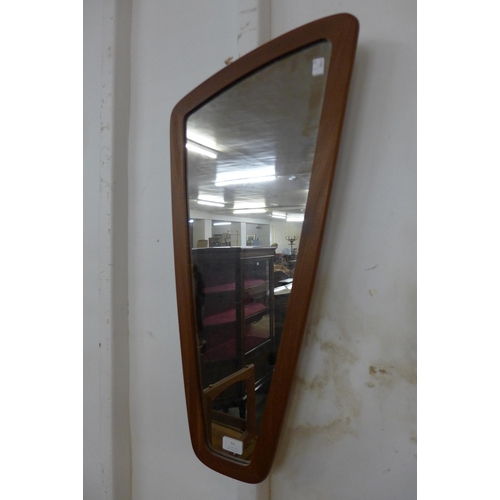 51 - A teak asymmetrical framed mirror and a cheval mirror