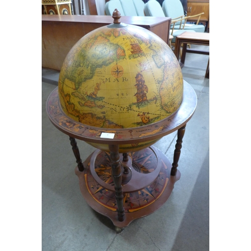 6 - An Italian terrestrial globe cocktail cabinet/trolley