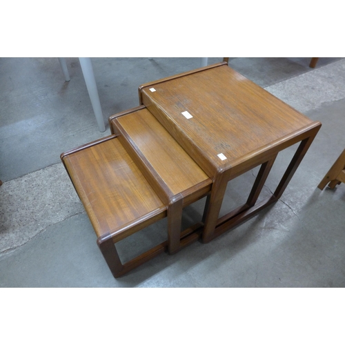 63 - A teak nest of tables