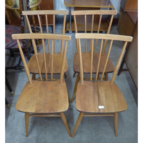 7 - A set of four Ercol elm and beech 391 model chairs