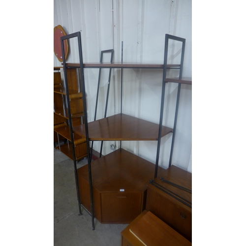 72 - An Avalon teak and black metal corner room divider