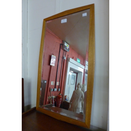 73 - A teak framed mirror