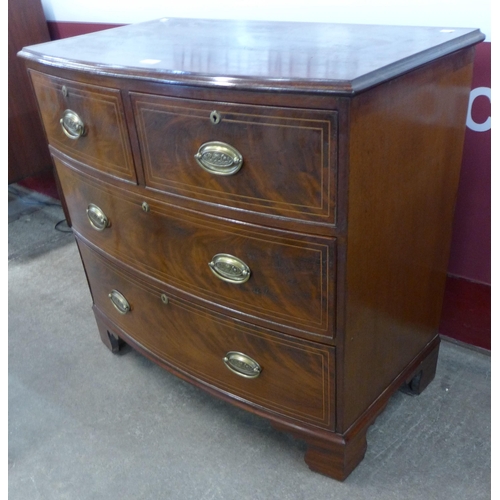 89 - A George III inlaid mahogany bow front chest of drawers