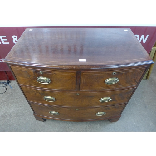 89 - A George III inlaid mahogany bow front chest of drawers