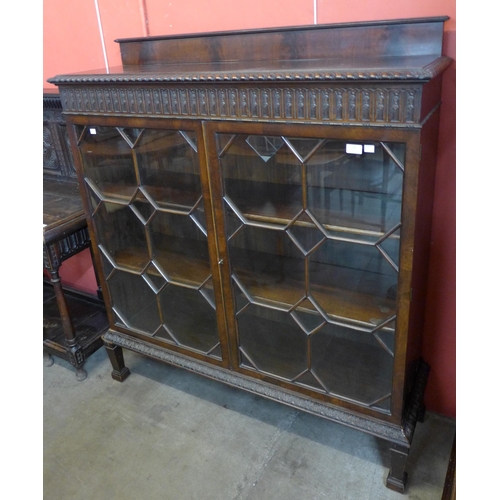 96 - An Edward VII Chippendale Revival mahogany two door bookcase