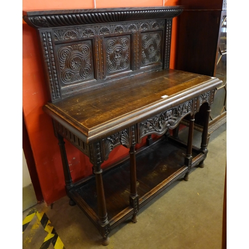 97 - A Victorian Jacobean Revival carved oak hall table