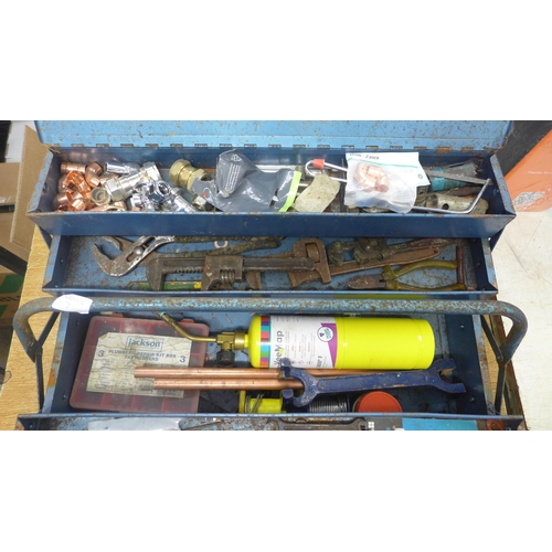 2014 - A metal cantilever toolbox with quantity of plumbing supplies