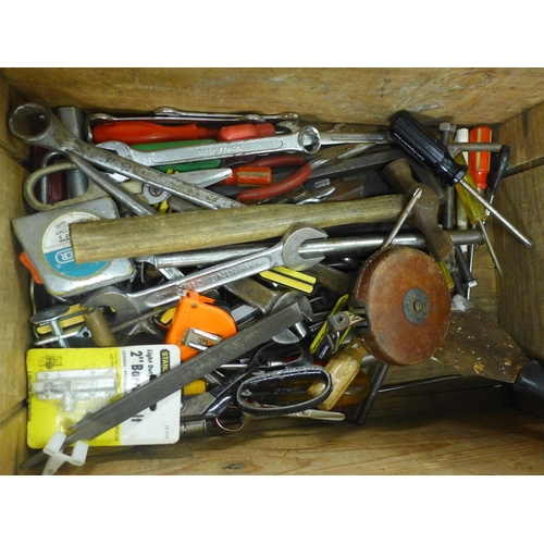 2035 - A box of assorted hand tools including- hammers, screwdrivers, tapes etc.