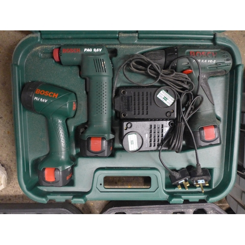 2070 - A quantity of power tools including a Black & Decker Proline 9236-7 cordless power drill with batter... 