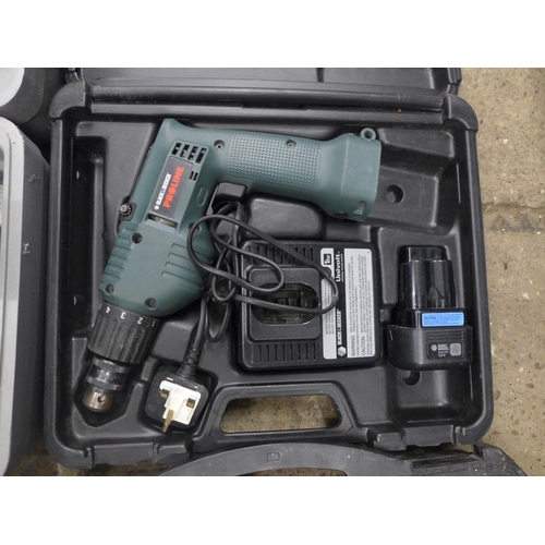 2070 - A quantity of power tools including a Black & Decker Proline 9236-7 cordless power drill with batter... 