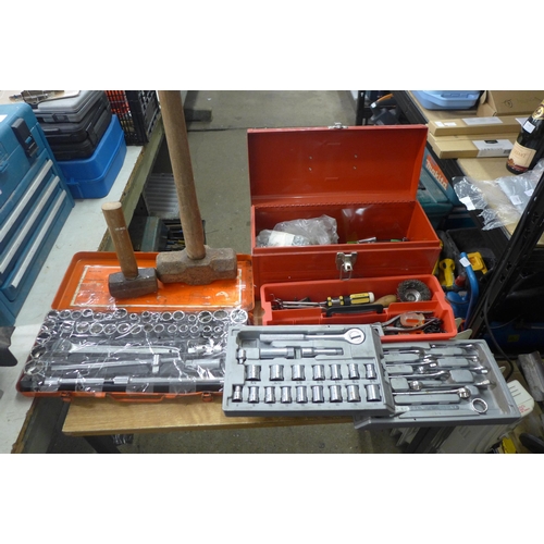 2081 - A metal tool box with assorted hand tools, spanners, socket set, saw, sledgehammer (one large, one s... 