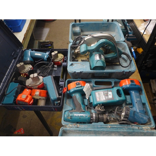 2117 - A selection of Makita power tools including an 83900 power drill, two flash lights, a 5704R 110v cir... 