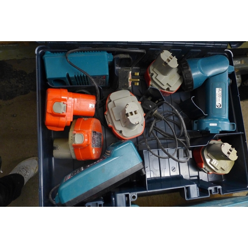 2117 - A selection of Makita power tools including an 83900 power drill, two flash lights, a 5704R 110v cir... 