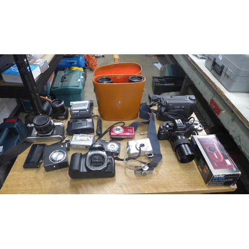 2136 - A pair of Zenith 10 x 50 binoculars, cased, Pentax SP1000 SLR camera, Praktica BMS camera, video cam... 