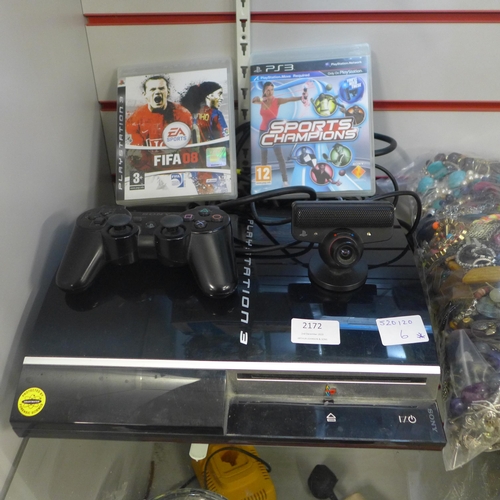 2172 - A Playstation 3 with motion controller, plus games - complete (Sony controller, Sony Motion Eye and ... 