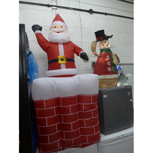 2255 - A Kingfisher inflatable animatronic Santa and light up animatronic snowman