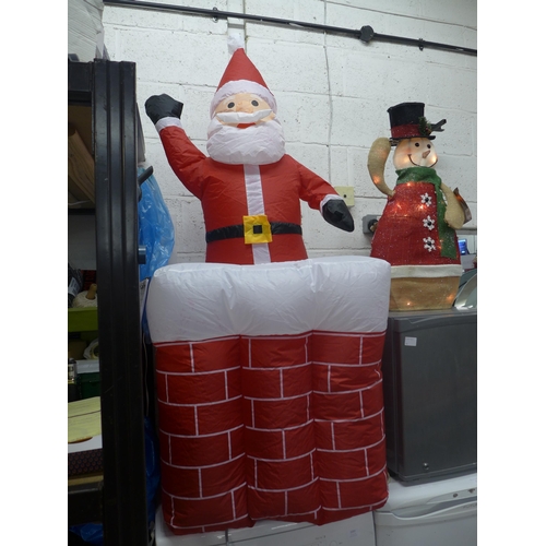 2255 - A Kingfisher inflatable animatronic Santa and light up animatronic snowman