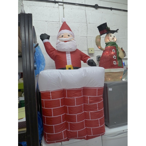 2255 - A Kingfisher inflatable animatronic Santa and light up animatronic snowman