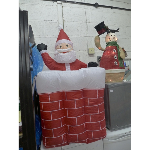 2255 - A Kingfisher inflatable animatronic Santa and light up animatronic snowman