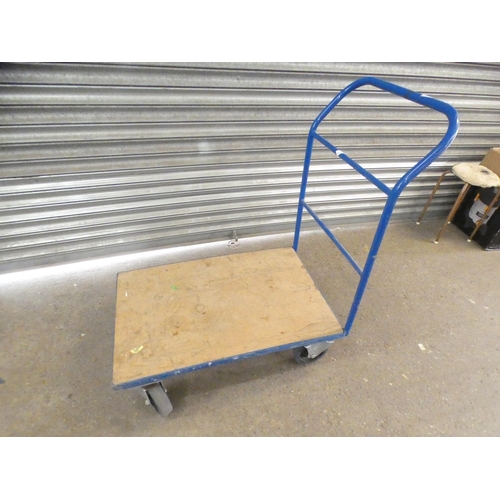 2289 - A 4 wheel flat bed trolley