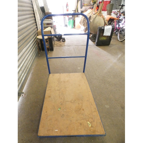 2289 - A 4 wheel flat bed trolley