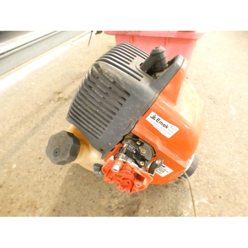 2307 - An Efco Stark 25TR grass cutter, a box of tools and misc. items