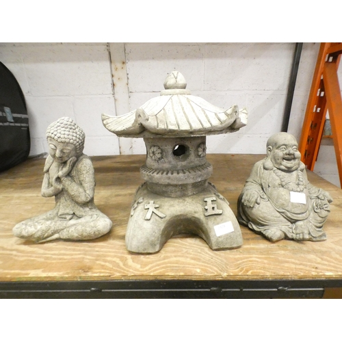 2328 - 2 stone effect Buddhas figures and a Pagoda