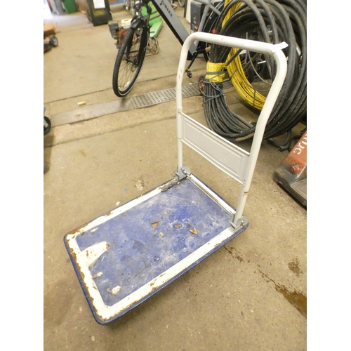 2337 - A 4-wheel flat bed folding trolley