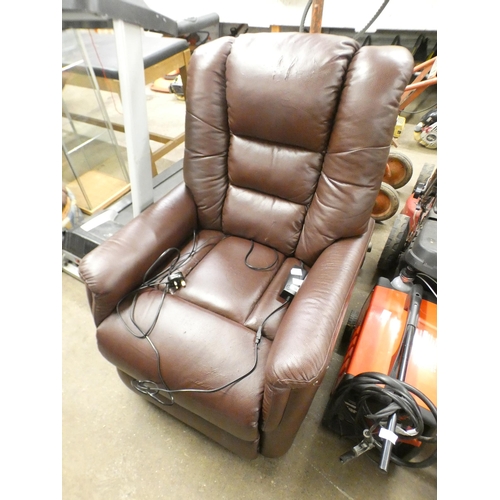 2347 - A tan leather effect electric Rise and Recline armchair