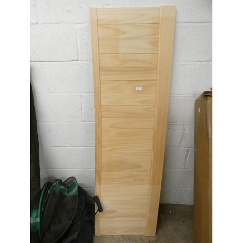 2355 - A light wood bath panel