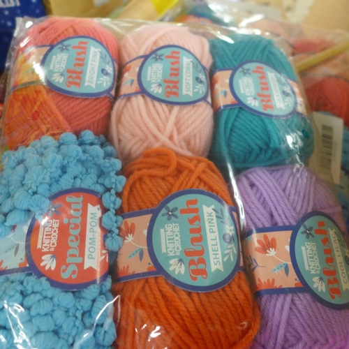 2449 - Approximately 100 knitting kits and balls of wool