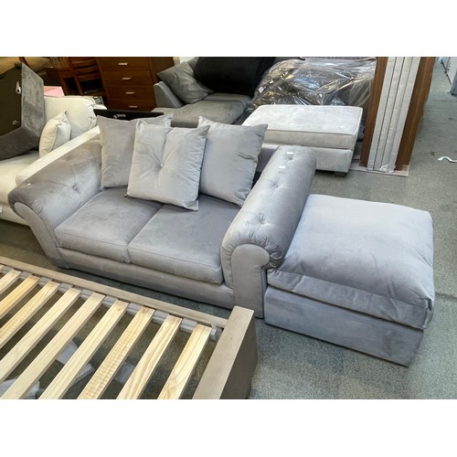 1579 - A grey velvet upholstered buttoned arm scatter back two seater sofa and cushion top footstool - dama... 