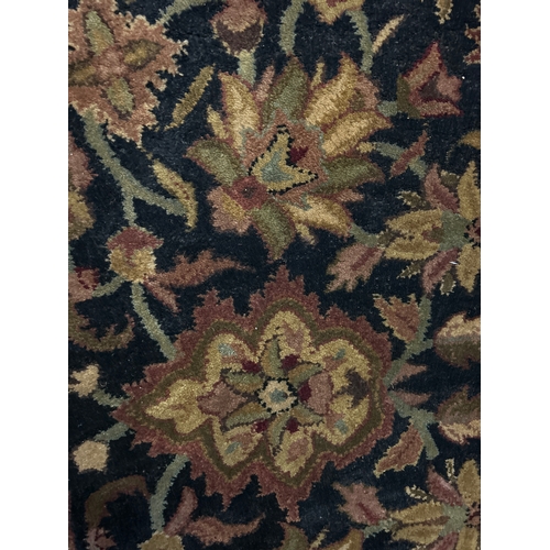 1522 - A 100% wool pile, Indian Agra rug, 8ft x 5ft