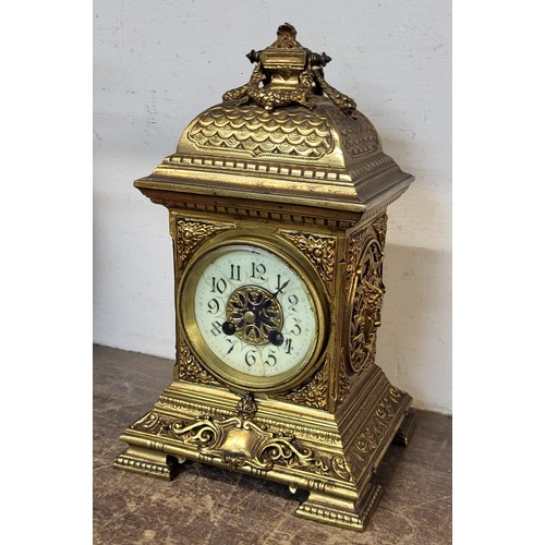 402 - A 19th Century French brass mantel clock