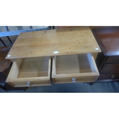 204 - A Victorian style pine two drawer kitchen serving table