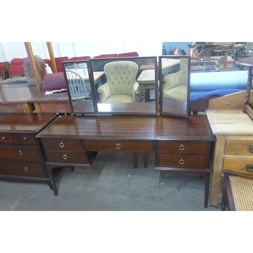 206 - A Stag Minstrel mahogany chest of drawers and dressing table