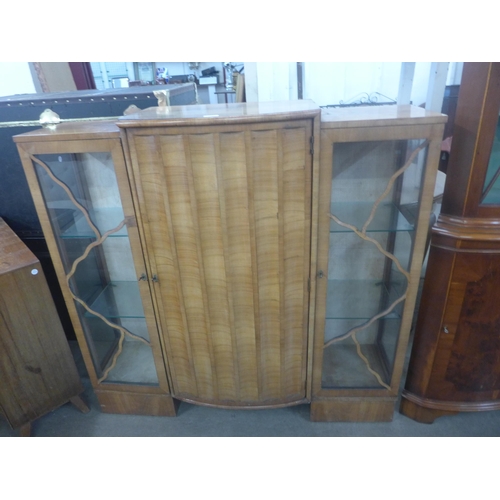 212 - An Art Deco walnut display cabinet