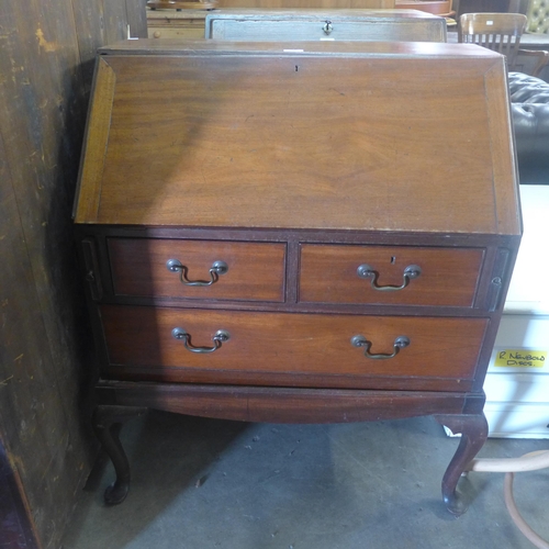 219 - A Queen Anne style mahogany bureau