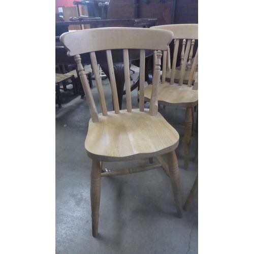 232 - A set of six Victorian style beech kitchen chairs