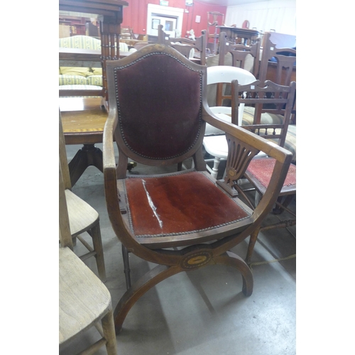 233 - An Edward VII inlaid mahogany x-frame armchair and a  pair of child's elm and beech chairs