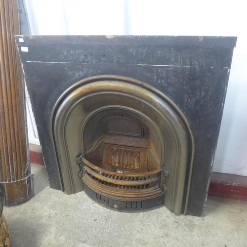 251 - A Victorian cast iron fire surround