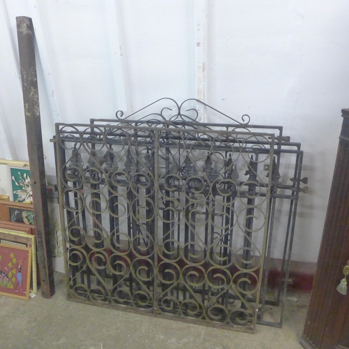 254 - Four wrought steel garden gates and a panel