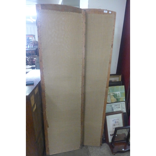 255 - A pair of pine two panel folding dressing screens