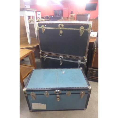 256 - Three large vintage steamer trunks