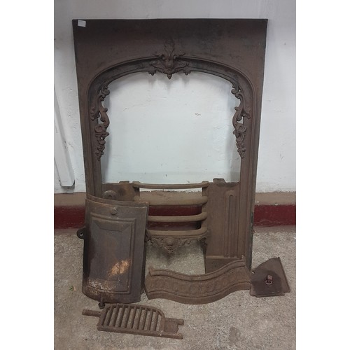 250A - A Victorian cast iron fireplace