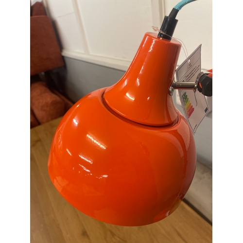 1320 - An orange anglepoise lamp